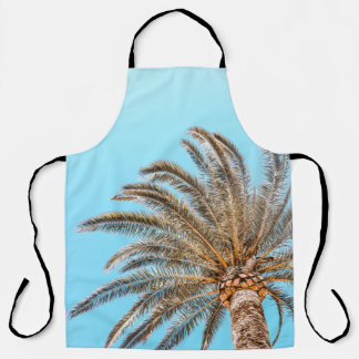 Tablier Photographie en angle bas d'un palmier vert sous u
