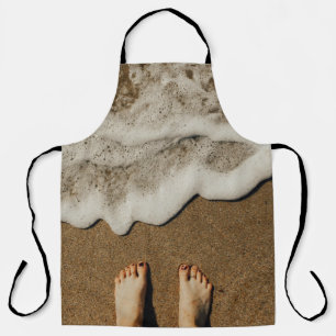 Tablier Pieds de personne en bord de mer