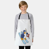 Tablier Pingouin comme skieur avec ski (Porté)