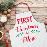 Tablier Premier Noël en tant que maman<br><div class="desc">Ce tablier de Noël est parfait pour célébrer le premier Noël en tant que mère. Le texte dit "Premier Noël comme maman" en lettres rouges modernes sur un arrière - plan blanc.</div>