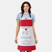 Tablier Rouge à pois blanc avec une recette. (Porté)