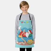 Tablier Santa Claus on the couch in pajamas (Porté)