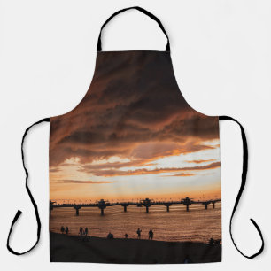 TABLIER SILHOUETTE DE PERSONNES SUR LA PLAGE PENDANT LE CO