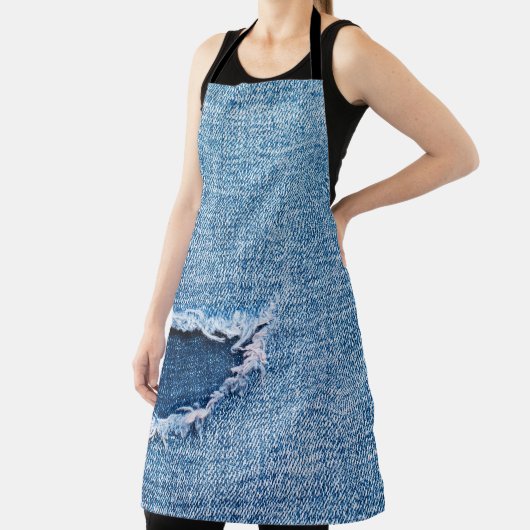 Tablier Tissu en denim déchiré, teintes bleues. (Insitu)