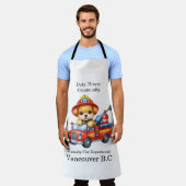 Tablier Un pompier à chiot mignon conduit un camion miniat (Porté)