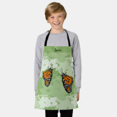 Tablier vert pour enfants avec un joli papillon mo (Porté)