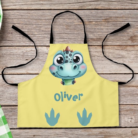 Tablier Visage et empreintes de bébé dinosaure mignons