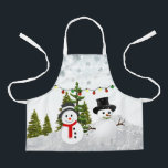 Tablier White Christmas Snowman / Scène de neige pour enfa<br><div class="desc">Ce tablier artisanal et cuisine a été créé pour les enfants. Il présente un de mes collages de bonhommes de neige,  de sapins et un brin de lumières de Noël. Portez ce tablier tout au long des vacances pour des ateliers,  artisanat,  fêtes et pour la cuisine.</div>