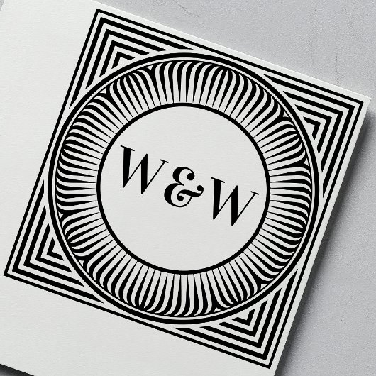 Tampon auto-encreur à monogramme géométrique