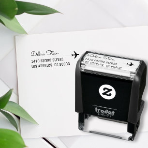 Tampon Auto-encreur avion et nom de voyage, simple et clair