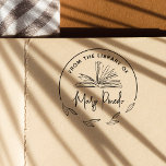 Tampon Auto-encreur De la bibliothèque d'un ex-libris botanique tampon<br><div class="desc">Ce design élégant de tampon auto-encreur présente une illustration de livre dessinée à la main et une bordure de feuilles botaniques. Il y a un cadre circulaire autour de la zone que le motif de feuille ne couvre pas. À l'intérieur du cadre botanique, "De la bibliothèque de" est écrit en...</div>