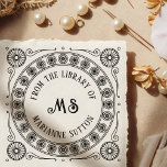 Tampon Auto-encreur "From the library of" Monogram Library Bookplate<br><div class="desc">Make your mark with timeless sophistication. This Victorian-style "From the library of" Monogram Library Bookplate self-inking stamp features the classic phrase “From the Library of” in elegant type. Surrounded by intricate circular filigree and scroll accents, your custom name and monogram take center stage in this ornate bookplate motif. Ideal for...</div>