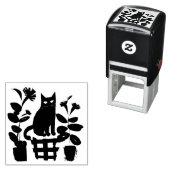 Tampon Auto-encreur Un Chat Noir Avec Des Usines (En situation)