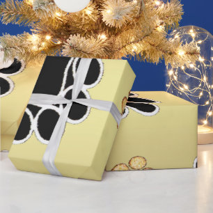 Tan- en zwart-witafdrukken op een gouden achtergro cadeaupapier