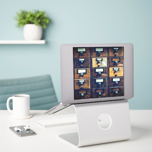  tapecataloguskast voor tapecatalogus sticker (Laptop op bureau)