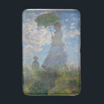 Tapis De Bain Claude Monet Femme à l'ombrelle Beaux-Arts<br><div class="desc">"Femme à l'ombrèlle - Madame Monet et son fils" (1875) est un chef-d'œuvre par excellence de Claude Monet, le père de l'impressionnisme français. Ce tableau emblématique capture un moment d'été fugace alors que son épouse Camille et son fils Jean se promènent à travers une prairie baignée de soleil. Monet utilise...</div>