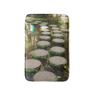 Tapis de bain de pierres de progression