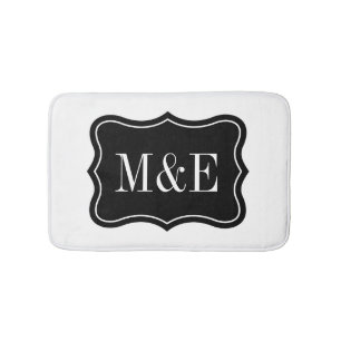 Tapis de bain élégant à monogramme noir et blanc