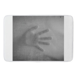 Tapis De Bain main dans la douche