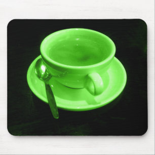 Tapis De Souris Coupe de café vert sur une table noire