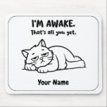 Tapis De Souris Funny Lazy Cat Mouse Pad | Custom I’m Awake Design<br><div class="desc">For mornings when being awake is already a big accomplishment. This funny personalized mouse pad features a tired lazy cat and the sarcastic phrase “I’M AWAKE. That’s all you get.” Add your name to create a cute and relatable desk accessory for work, study, or home office. A great gift for...</div>