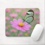 Tapis De Souris Glasswing Butterfly On a Cosmos Flower<br><div class="desc">A delicate glasswing butterfly with transparent wings gently settles on a vibrant pink cosmos flower,  creating a dreamlike scene enhanced by a soft focus background</div>