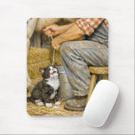 Tapis De Souris Kitten Drinking Cow Milk<br><div class="desc">Cute tuxedo kitten enjoys fresh milk while a farmer sits on a wooden stool milking a cow in the barn</div>
