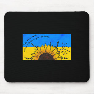 Tapis De Souris Prendre des graines de tournesol mises dans des po