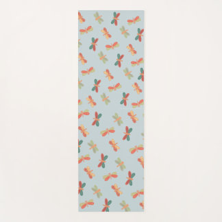 Tapis de yoga avec un motif de libellule joyeuse.