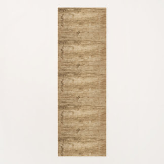 Tapis De Yoga Mat avec un motif en bois.