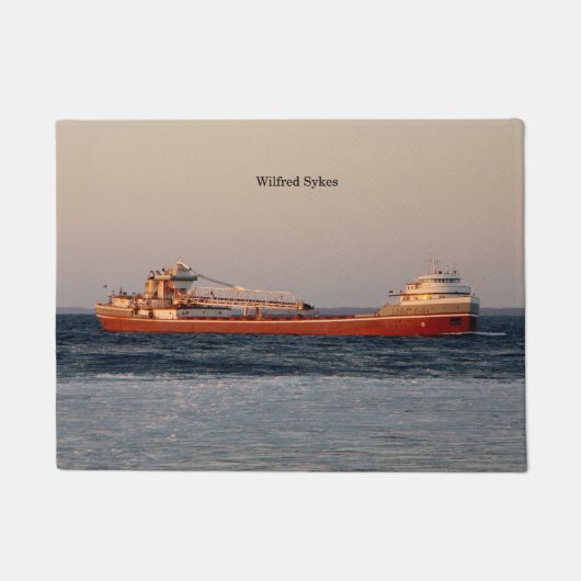 Tapis porte Wilfred Sykes (Devant)