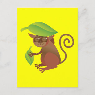 Tarsier verbergt zich onder een groen blad briefkaart