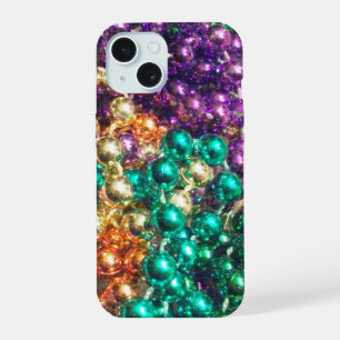 Tas de perles de Mardi Gras scintillant à la lumiè