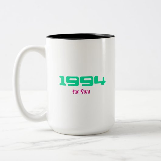 Tasse 2 Couleurs 1994 Meilleur morceau, Le Signe (Gauche)