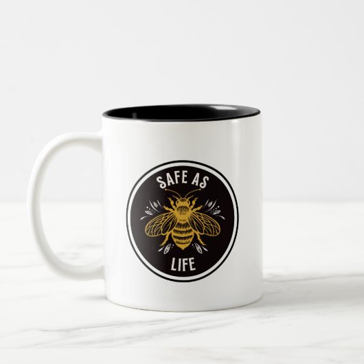 Tasse 2 Couleurs Aussi sûr que la vie (Gauche)