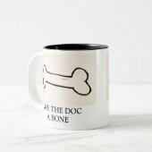 TASSE 2 COULEURS DONNEZ AU DOC. UN OS (Devant gauche)