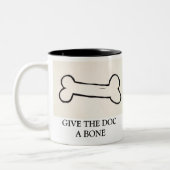 TASSE 2 COULEURS DONNEZ AU DOC. UN OS (Gauche)