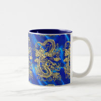 Dragon d'or embouti sur papier satin bleu
