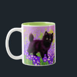 Tasse 2 Couleurs Gustav Klimt Black Kitten<br><div class="desc">Mug café avec un chaton noir Gustav Klimt ! Cette beauté aux yeux larges pose dans un champ vert de fleurs violettes. Un cadeau bien pensé pour les amateurs d'art amoureux des chats et autrichiens !</div>