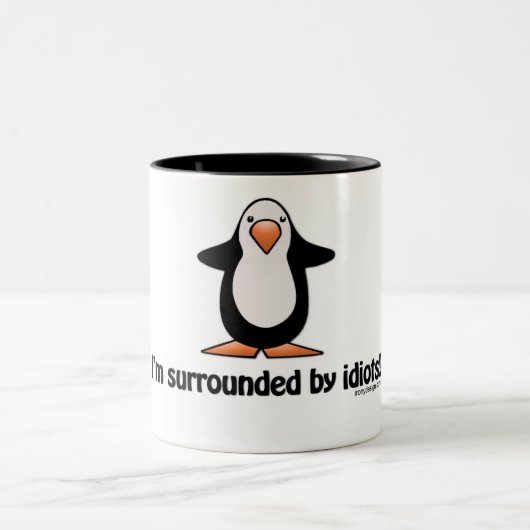 Tasse 2 Couleurs Je suis entouré par des idiots ! (Centre)