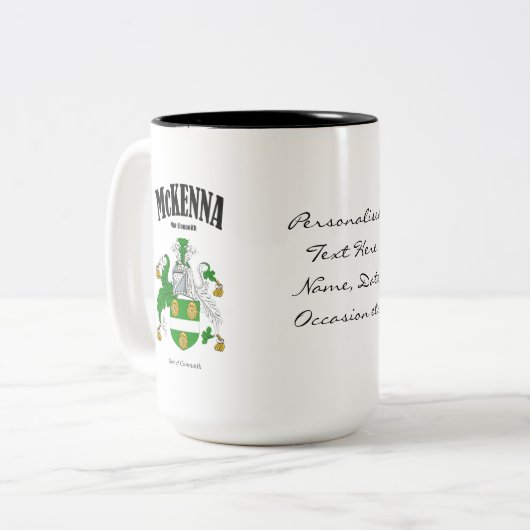 Tasse 2 Couleurs McKenna Family Crest, Traduction & Signification (Devant gauche)