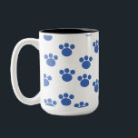 Tasse 2 Couleurs Motif Empreinte de patte animal. Bleu et Blanc.<br><div class="desc">Motif empreinte de patte bleu sur un arrière - plan blanc.</div>