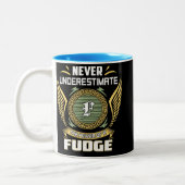 Tasse 2 Couleurs Ne sous-estimez jamais le pouvoir d'un fudge (Gauche)