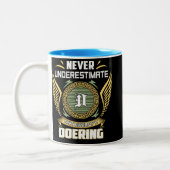 Tasse 2 Couleurs Never Underestimate The Power Of A Doering (Gauche)