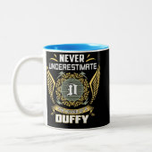 Tasse 2 Couleurs Never Underestimate The Power Of A Duffy (Gauche)