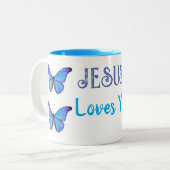 Tasse 2 Couleurs Papillons bleus Jésus vous aime (Devant gauche)