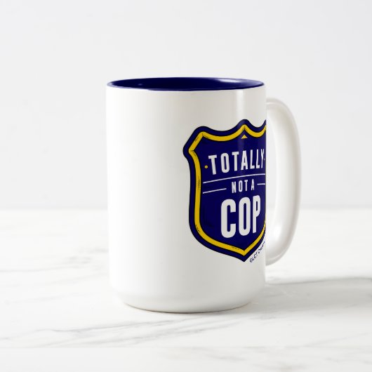 Tasse 2 Couleurs Pas un flic (Devant droit)