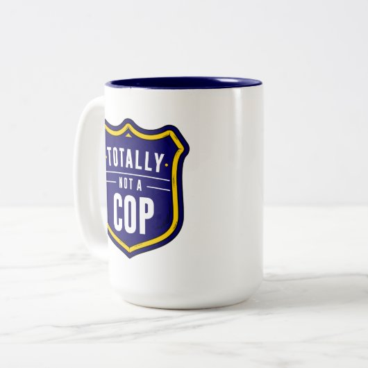 Tasse 2 Couleurs Pas un flic (Devant gauche)