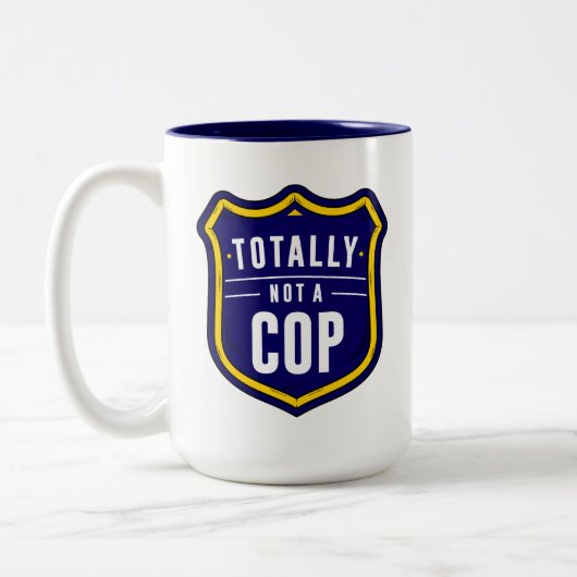 Tasse 2 Couleurs Pas un flic (Gauche)