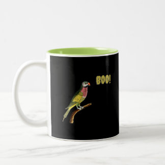 Tasse 2 Couleurs Perroquet vibrant sur une branche avec un "BOO!" a
